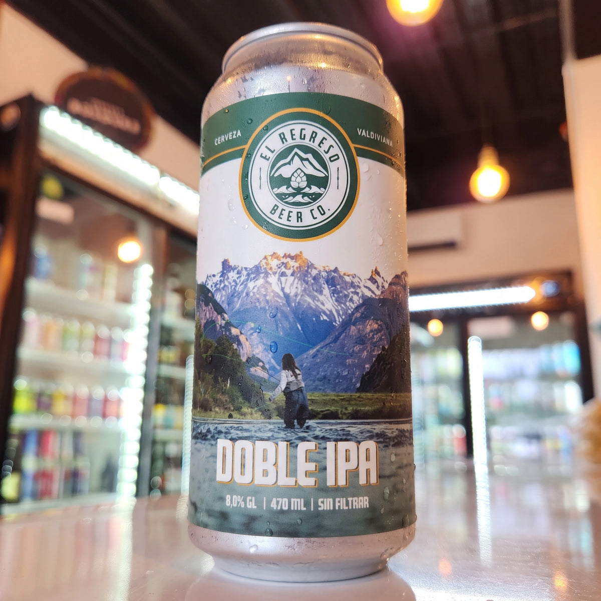 Cerveza artesanal El Regreso Doble IPA 8.0% ABV 70 IBU 470cc nueva etiqueta Cerro Castillo pesca con mosca. Disponible en Puerto Cervecero, Puerto Varas Chile.
