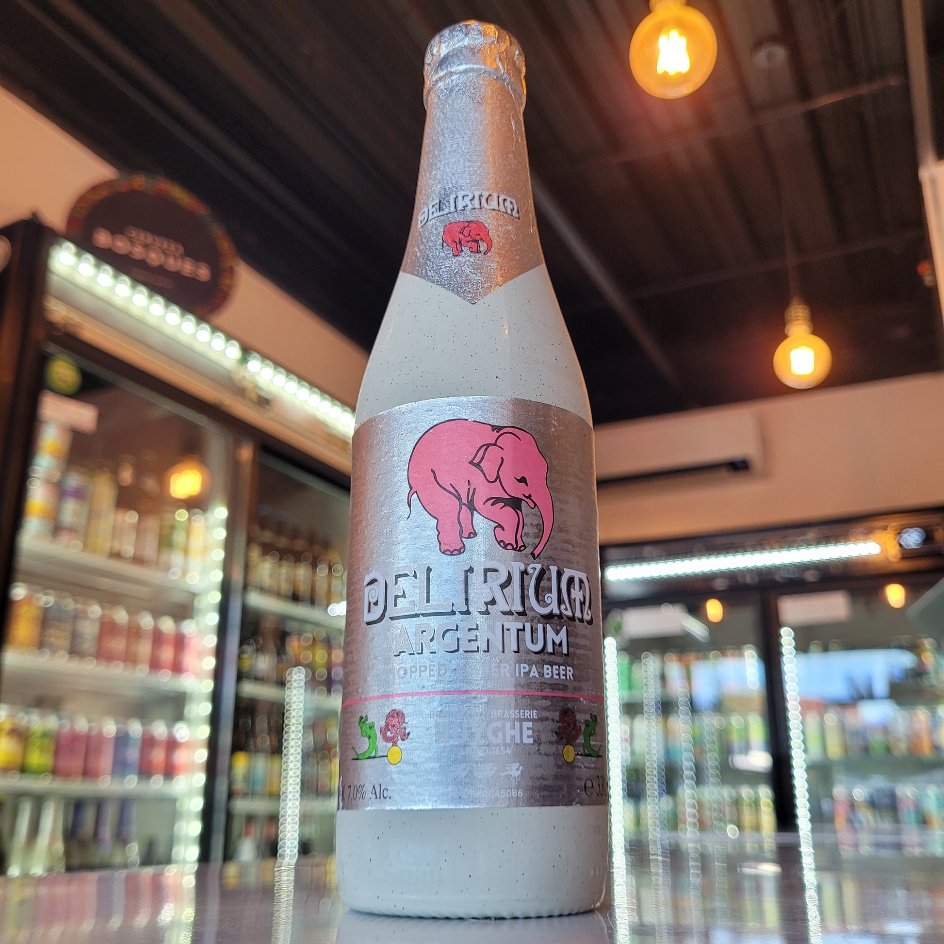 Foto de Delirium Argentum Hopped Amber IPA 330ml - Cerveza Artesanal en Puerto Cervecero, Puerto Varas