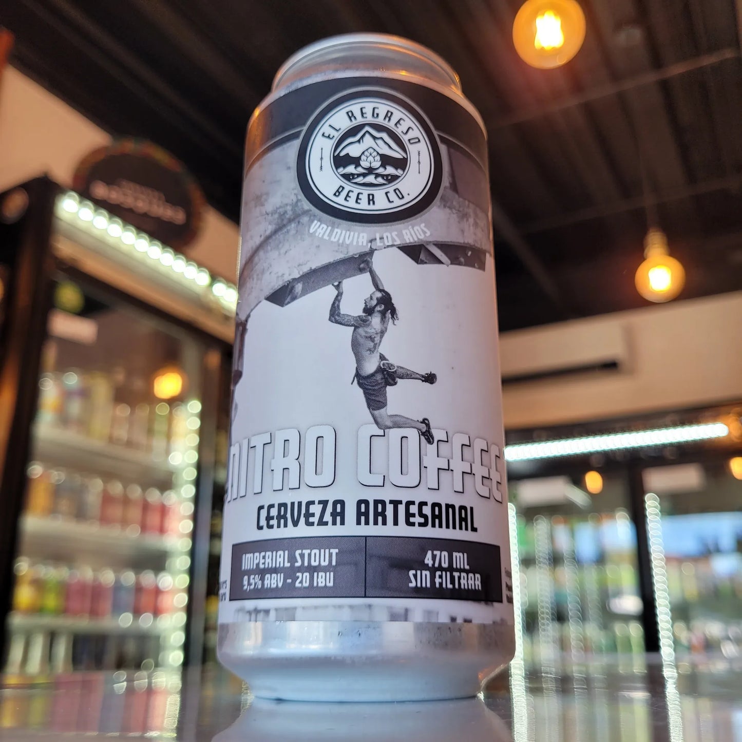 Cerveza artesanal chilena El Regreso Nitro Coffee Imperial Stout 470cc. Disponible en Puerto Cervecero, Puerto Varas Chile.