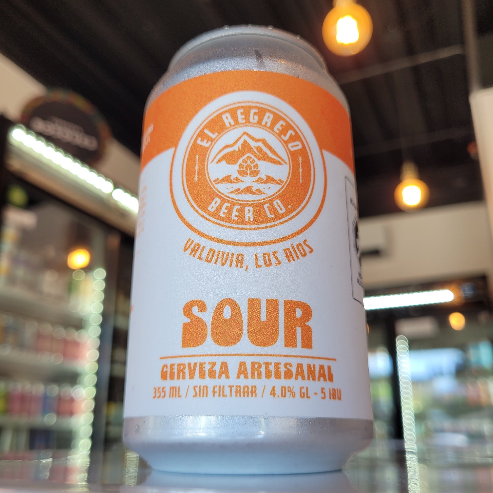 Foto de El Regreso Sour del Caribe Sour Frutal Naranjilla y Guayaba 355ml - Cerveza Artesanal en Puerto Cervecero, Puerto Varas
