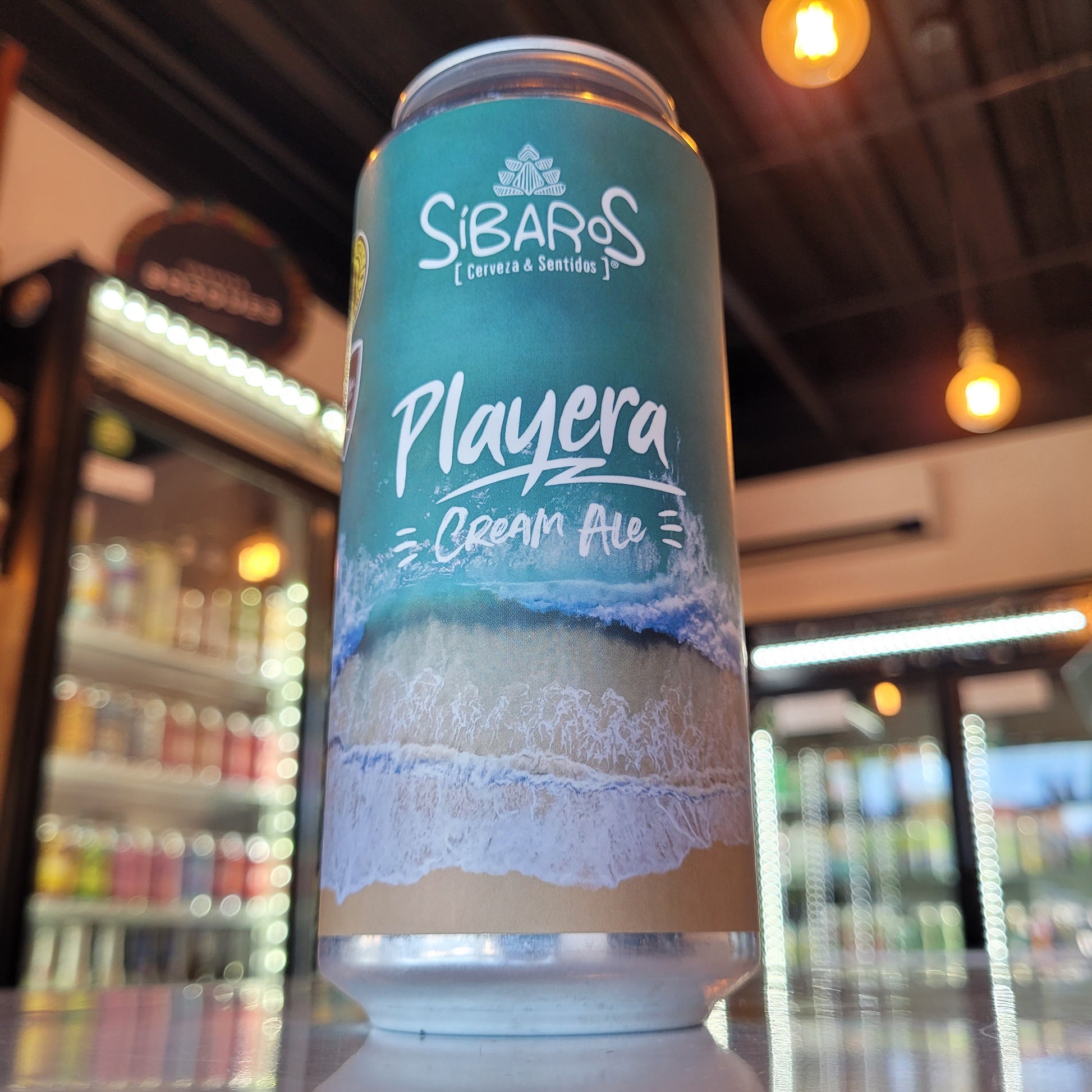 Foto de Síbaros Playera Cream Ale 473ml - Cerveza Artesanal en Puerto Cervecero, Puerto Varas