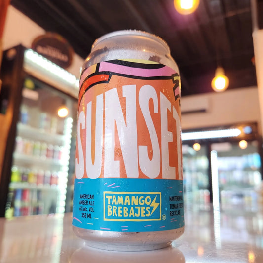 Cerveza artesanal chilena Tamango Sunset American Amber Ale 355cc. Disponible en Puerto Cervecero, Puerto Varas Chile.
